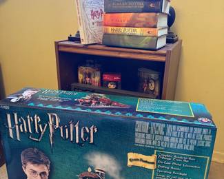 Harry Potter Lionel Train set with steam engine, cars, track, and controller, hardback and paperback Harry Potter books, Elder wand and figurines