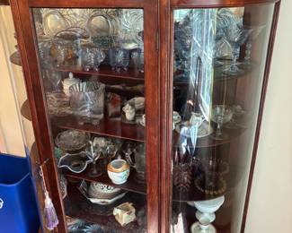 China cabinet packed with dishes and glassware!