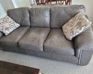 Ashley's Granite Colored Leather Sofa