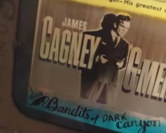 Vintage glass slides for magic lanterns advertising golden age films with stars like James Cagney, John Wayne, Joan Crawford, etc