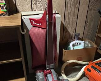 Vintage Kirby vacuum cleaner with attachments and original box