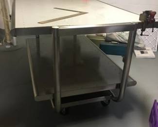 Rolling commercial workbench with shelves 6ft by 4ft