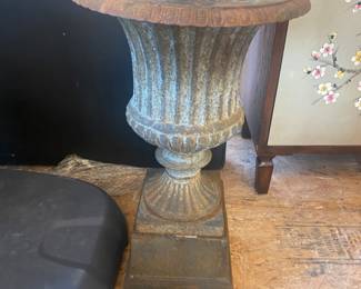 Cast iron urn on plinth