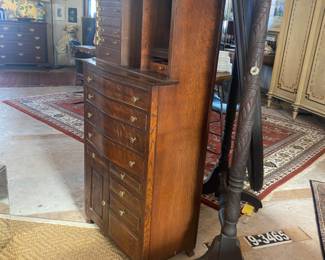 Antique oak dental cabinet with swing out drawers