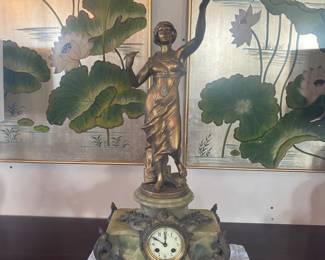 Antique figural clock