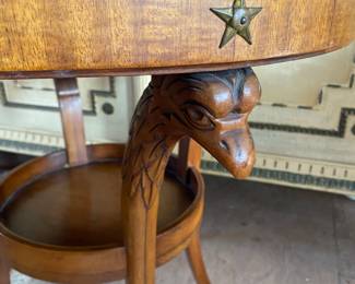 Vintage round table w/bird head carvings