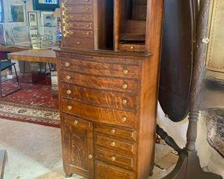 Antique oak dental cabinet with swing out drawers