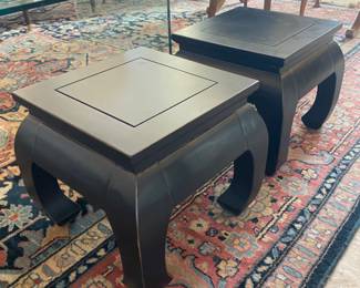 Two black Asian seats/low tables