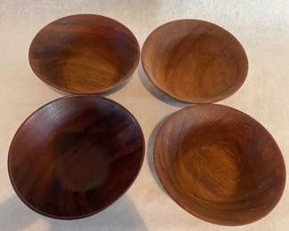 Four teak salad bowls