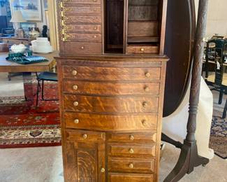 Antique oak dental cabinet with swing out drawers