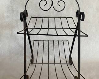 Vintage iron magazine stand