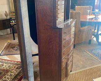 Antique oak dental cabinet with swing out drawers