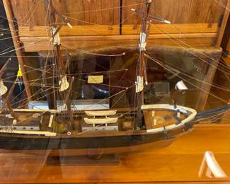 Vintage model ship in clear plexiglass case