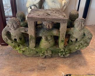 Large concrete boat w/people