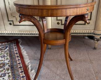 Vintage round table w/bird head carvings