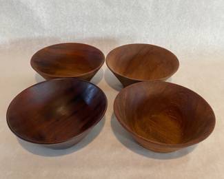 Four teak salad bowls