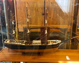 Vintage model ship in clear plexiglass case