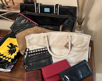 Handbags, Wallets and Luggage can all be found at our Johns Creek estate sale