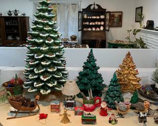 Multiple ceramic Christmas trees with removable plastic lights/pegs. The LARGE one has bird shaped pegs. 