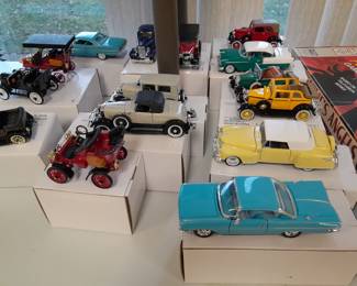 Several die cast cars