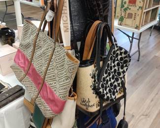 Tons of purses.  Some Coach