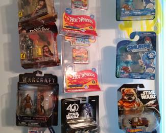 Unopened Toys: Smurfs, Hot Wheels, Warcraft, Duck Dynasty