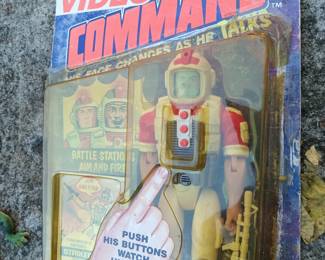 Video Command in Package(plastic cracking and stapled to backing)