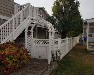 Garden arch; vinyl fencing
