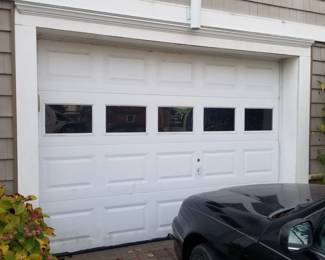 Insulated garage door is 10 ft. wide x 7 ft. tall