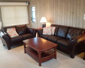 Italian leather living room furniture made by Chateau d'Ax; coffee table & end table by Renaissance