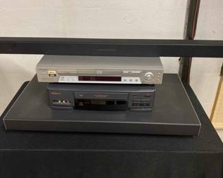 Vizio Sound Bar And Sub Woofer, Sony DVD Player, And Hitachi VHS Player