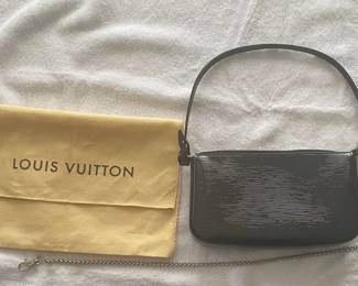 Louis Vuitton handbag and sleeve