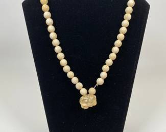 Beaded Necklace With Asian Motif Pendant
