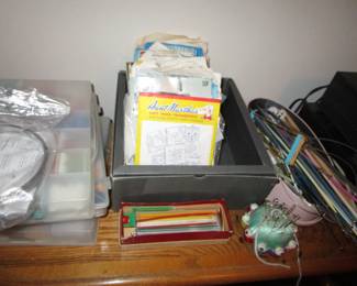 Patterns, crochet hooks, knitting needles