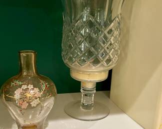 Emile Galle, France.  Amber glass, finely enameled hand painted floral design with leafy stems, ground and polished pontil, signed lower side. Circa mid to late 19th century.  Measurements 6 1/2" H  one of a pair. 