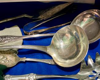 Assortment of ladle and serving pieces