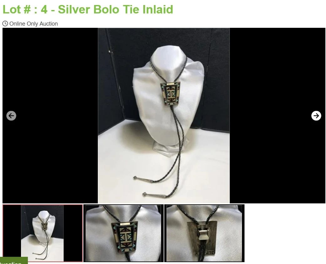 Signed on back, hand made with woven cord with silver tips. 38.9 grams of tested silver.