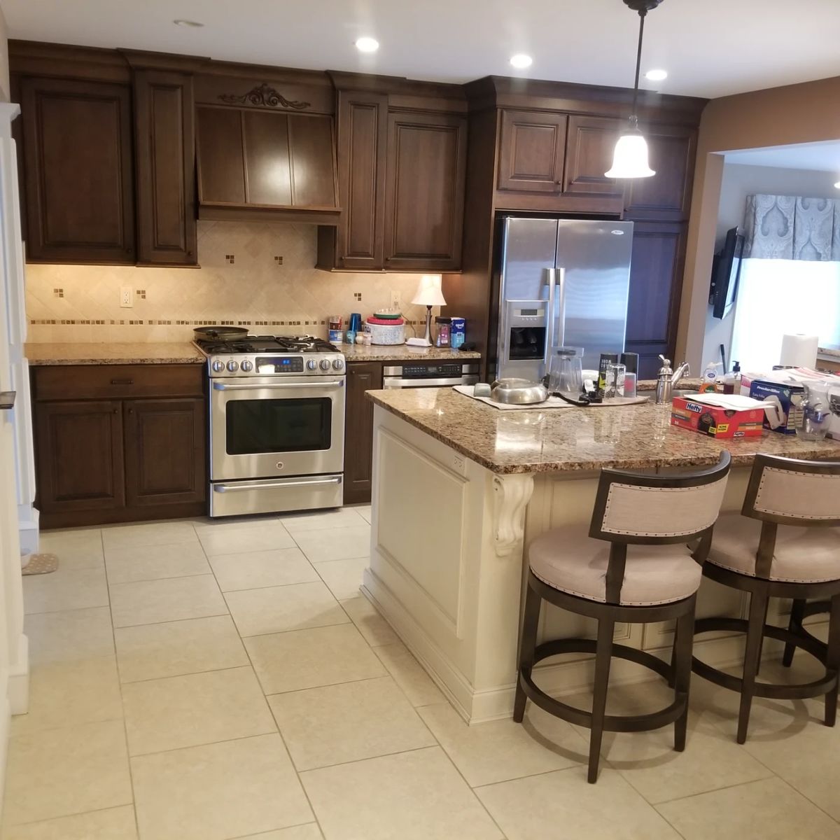 Handsome galley kitchen has ample cabinetry