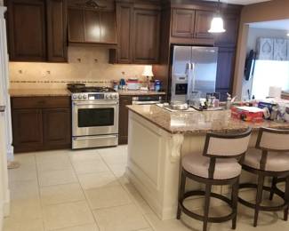 Handsome galley kitchen has ample cabinetry