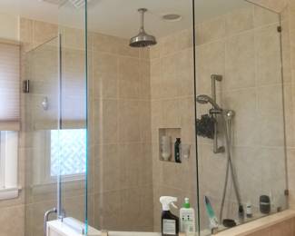 Glass shower surround; shower hardware