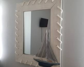 Sailboat wall mirror with rope accents
