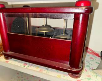Funky thing that makes tinkling noises with little ball bearings... beautiful and useless 