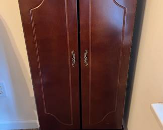 Dark wood jewelry cabinet