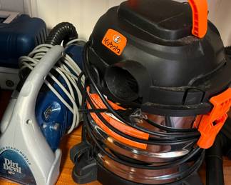 Dirt Devil hand vac and Kubota shop vac