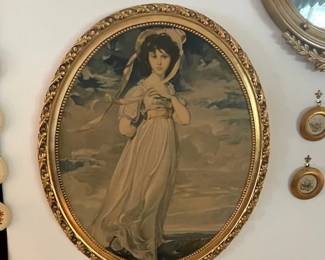 Vintage "Pinkie" in gold oval frame.