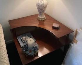 Corner table with lamp.