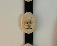 Wall hanging with decoration pins.
