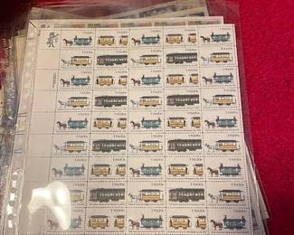 Large selection of postage stamps (full sheets, uncirculated).