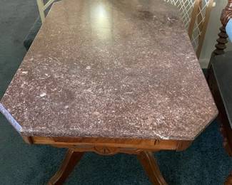 Antique Victorian Eastlake walnut marble top table.