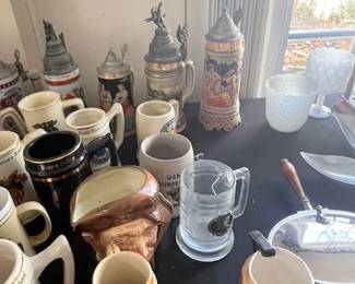 Beer steins and Toby mugs.